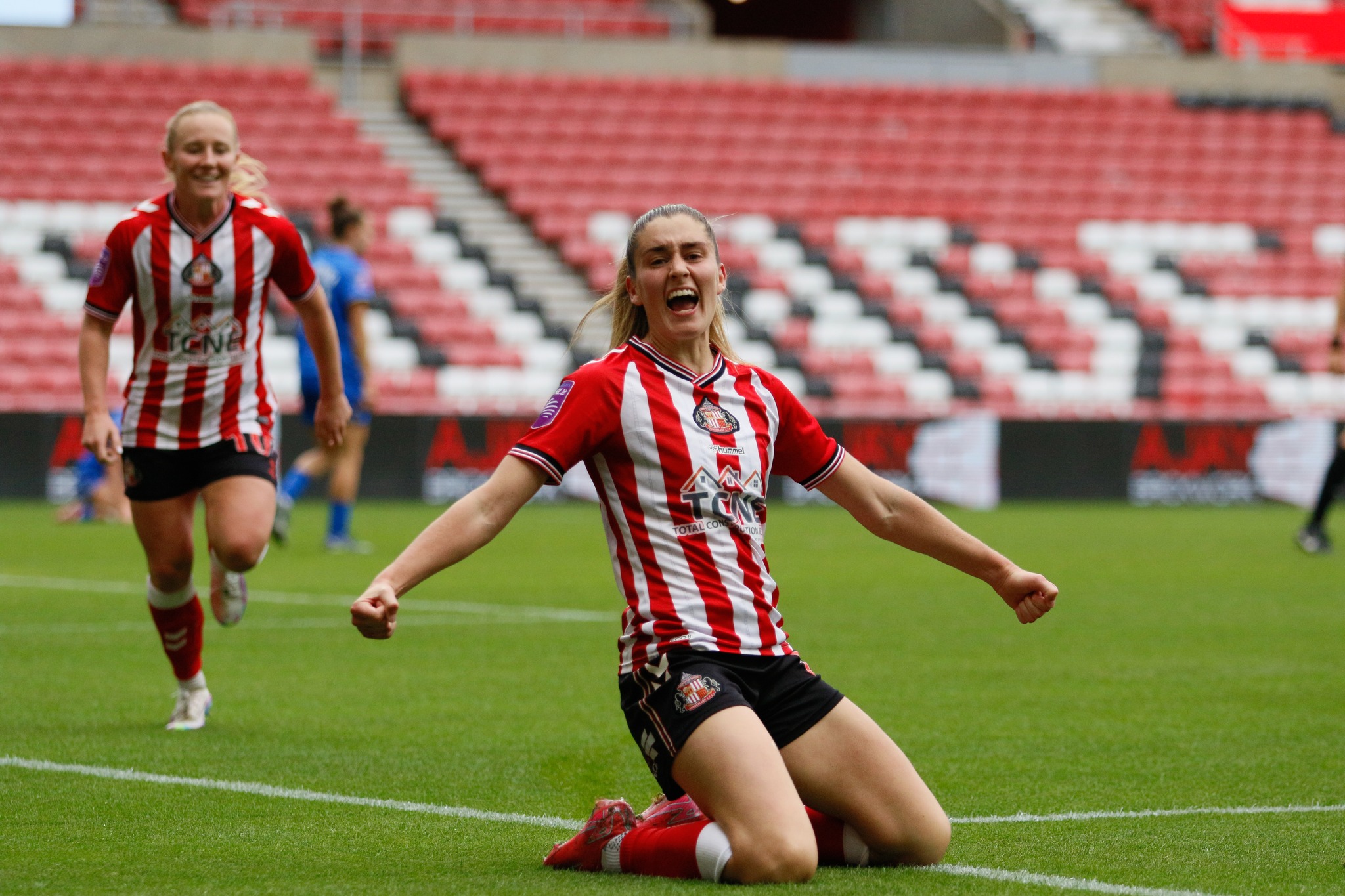 Sunderland AFC Women celebrating a goal during a WSL2 match.